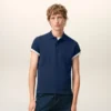 Ami de Coeur Polo de algodón azul de manga corta Ami de Coeur Polo de algodón azul de manga corta