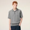Ami de Coeur Polo de manga corta en lana gris Ami de Coeur Polo de manga corta en lana gris