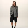 Bermudas anchas de cintura baja de lana nueva negra Bermudas anchas de cintura baja de lana nueva negra