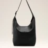 Bolso bandolera Etienne de piel de taurillón negra Bolso bandolera Etienne de piel de taurillón negra