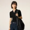 Bolso bandolera Etienne de piel de taurillón negra Bolso bandolera Etienne de piel de taurillón negra