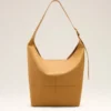 Bolso bandolera Etienne de piel de taurillon amarilla Bolso bandolera Etienne de piel de taurillon amarilla