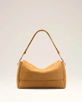 Bolso carrusel grande con solapa de piel de vaca amarilla