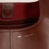 Bolso hobo Etienne de piel flexible en color burdeos Bolso hobo Etienne de piel flexible en color burdeos