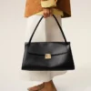 Bolso Mimi de piel de vaca negra Bolso Mimi de piel de vaca negra
