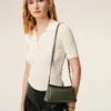 Bolso mini carrusel de piel de vaca verde Bolso mini carrusel de piel de vaca verde