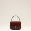 Bolso Paris Paris con asa de piel barnizada en color burdeos Bolso Paris Paris con asa de piel barnizada en color burdeos