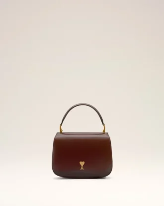 Bolso Paris Paris con asa de piel barnizada en color burdeos