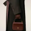 Bolso Paris Paris con asa de piel barnizada en color burdeos Bolso Paris Paris con asa de piel barnizada en color burdeos