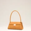 Bolso pequeño Mimi de piel de vaca naranja Bolso pequeño Mimi de piel de vaca naranja