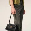 Bolso pequeño Mimi de piel de vaca negra Bolso pequeño Mimi de piel de vaca negra