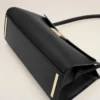 Bolso pequeño Mimi de piel de vaca negra Bolso pequeño Mimi de piel de vaca negra