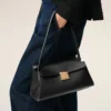 Bolso pequeño Mimi de piel de vaca negra Bolso pequeño Mimi de piel de vaca negra