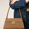 Bolso pequeño Mimi de piel de vacuno marrón Bolso pequeño Mimi de piel de vacuno marrón