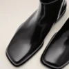 Botines de piel de vaca negra