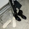Botines de piel de vaca negra