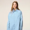 Camisa ancha de algodón azul con cuello de punta de Ami de Coeur Camisa ancha de algodón azul con cuello de punta de Ami de Coeur