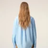 Camisa ancha de algodón azul con cuello de punta de Ami de Coeur Camisa ancha de algodón azul con cuello de punta de Ami de Coeur