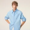 Camisa ancha de algodón azul con cuello de punta de Ami de Coeur Camisa ancha de algodón azul con cuello de punta de Ami de Coeur