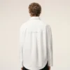 Camisa ancha de algodón blanco con cuello de punta y Ami de Coeur Camisa ancha de algodón blanco con cuello de punta y Ami de Coeur