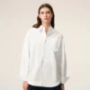 Camisa ancha de algodón blanco con cuello de punta y Ami de Coeur Camisa ancha de algodón blanco con cuello de punta y Ami de Coeur