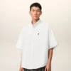 Camisa blanca de algodón de corte holgado con bordado Ami de Coeur Camisa blanca de algodón de corte holgado con bordado Ami de Coeur