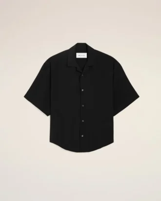 Camisa negra de manga corta con bordado «Ami Paris» y corte holgado