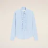 Camisas ajustadas de manga larga con volantes de algodón azul Camisas ajustadas de manga larga con volantes de algodón azul