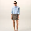 Camisas ajustadas de manga larga con volantes de algodón azul Camisas ajustadas de manga larga con volantes de algodón azul