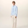 Camisas ajustadas de manga larga con volantes de algodón azul Camisas ajustadas de manga larga con volantes de algodón azul