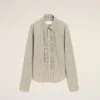 Camisas ajustadas de manga larga con volantes de algodón beige Camisas ajustadas de manga larga con volantes de algodón beige