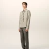 Camisas ajustadas de manga larga con volantes de algodón beige Camisas ajustadas de manga larga con volantes de algodón beige