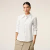 Camisas ajustadas de seda mezclada con cuello de punta en color blanco Camisas ajustadas de seda mezclada con cuello de punta en color blanco