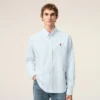 Camisas clásicas de manga larga de algodón azul con cuello abotonado y bordado «ADC» Camisas clásicas de manga larga de algodón azul con cuello abotonado y bordado «ADC»