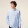 Camisas clásicas de manga larga de algodón azul con cuello abotonado y bordado «ADC» Camisas clásicas de manga larga de algodón azul con cuello abotonado y bordado «ADC»