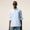 Camisas clásicas de manga larga de algodón azul con cuello abotonado y bordado «ADC» Camisas clásicas de manga larga de algodón azul con cuello abotonado y bordado «ADC»
