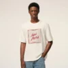 Camiseta blanca de algodón Ami Paris con estampado Heritage Camiseta blanca de algodón Ami Paris con estampado Heritage
