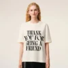 Camiseta blanca de algodón con estampado característico Camiseta blanca de algodón con estampado característico