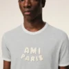 Camiseta de algodón gris Ami Paris con parche de punto Camiseta de algodón gris Ami Paris con parche de punto