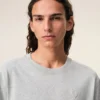 Camiseta gris de algodón con el logotipo «Ami de Coeur» en relieve Camiseta gris de algodón con el logotipo «Ami de Coeur» en relieve