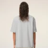 Camiseta gris de algodón con el logotipo «Ami de Coeur» en relieve Camiseta gris de algodón con el logotipo «Ami de Coeur» en relieve