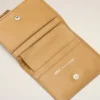 Cartera plegable Voulez-Vous de piel de vacuno amarilla Cartera plegable Voulez-Vous de piel de vacuno amarilla