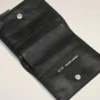 Cartera plegable Voulez-Vous de piel de vacuno negra Cartera plegable Voulez-Vous de piel de vacuno negra
