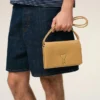 Cartera Voulez-Vous con correa de piel de vacuno amarilla Cartera Voulez-Vous con correa de piel de vacuno amarilla