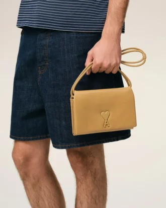 Cartera Voulez-Vous con correa de piel de vacuno amarilla