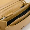 Cartera Voulez-Vous con correa de piel de vacuno amarilla Cartera Voulez-Vous con correa de piel de vacuno amarilla