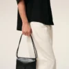 Cartera Voulez-Vous con correa de piel de vacuno negra Cartera Voulez-Vous con correa de piel de vacuno negra