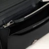 Cartera Voulez-Vous con correa de piel de vacuno negra Cartera Voulez-Vous con correa de piel de vacuno negra