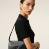Cartera Voulez-Vous con correa de piel de vacuno negra Cartera Voulez-Vous con correa de piel de vacuno negra