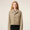 Chaqueta abotonada de algodón beige Chaqueta abotonada de algodón beige